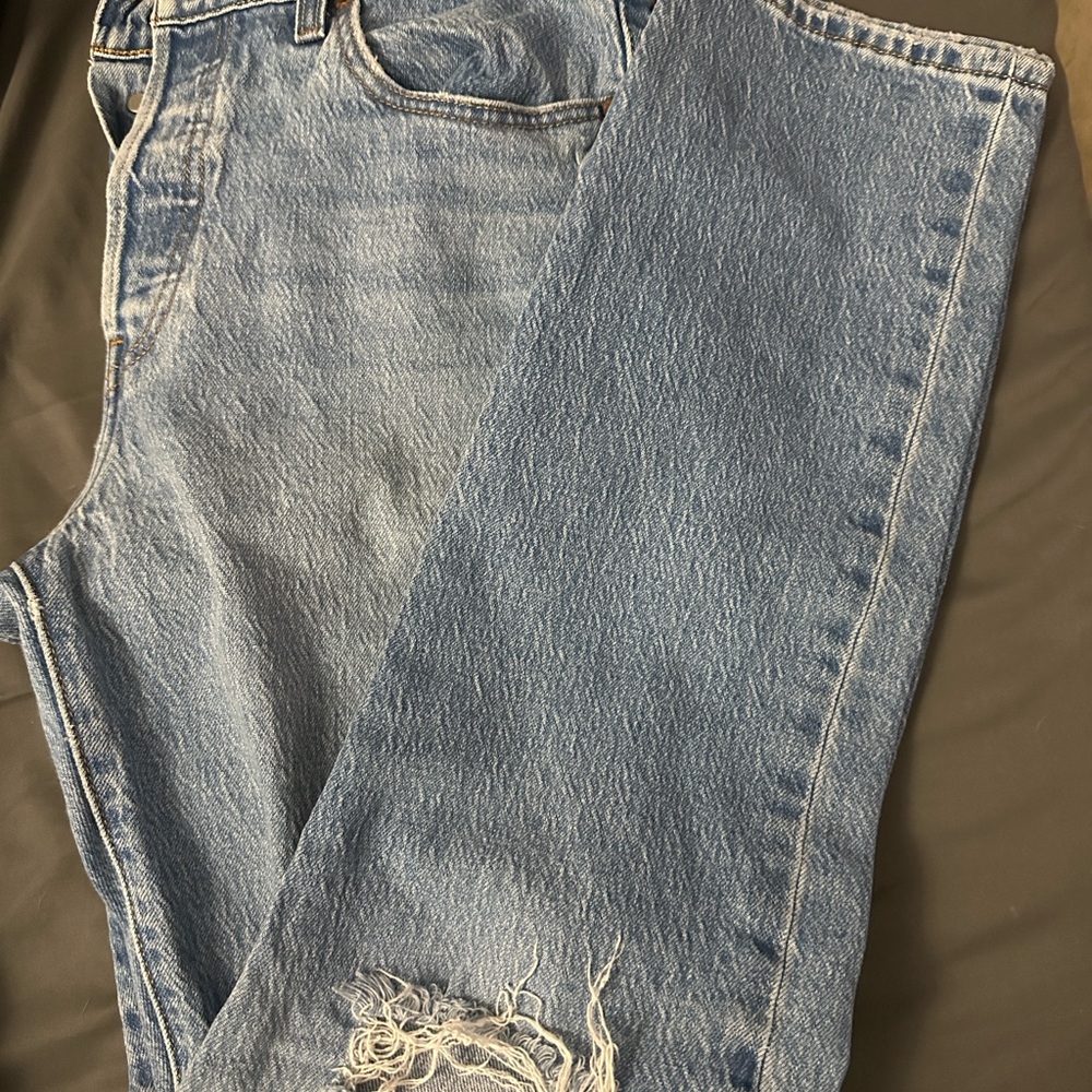 Distressed Blue Denim Jeans